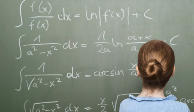 girl-solving-math-problem